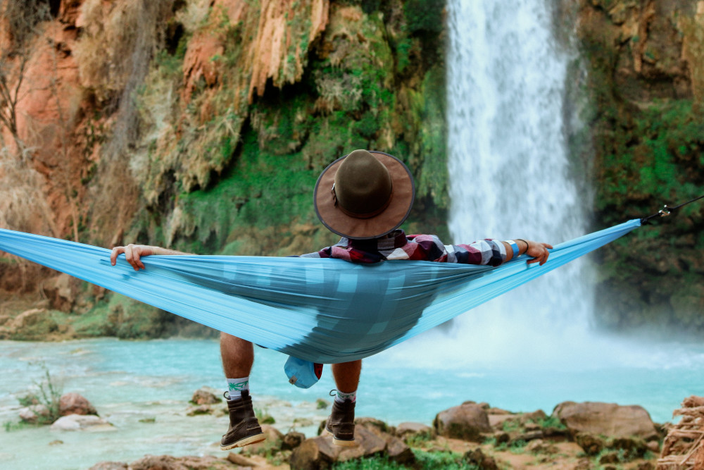 productivity tips man resting hammock