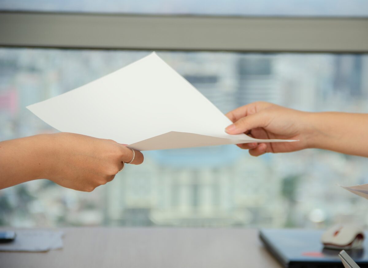 hands holding paper-summer sales