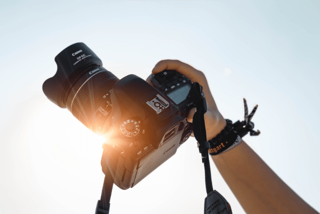 Man Holding Camera