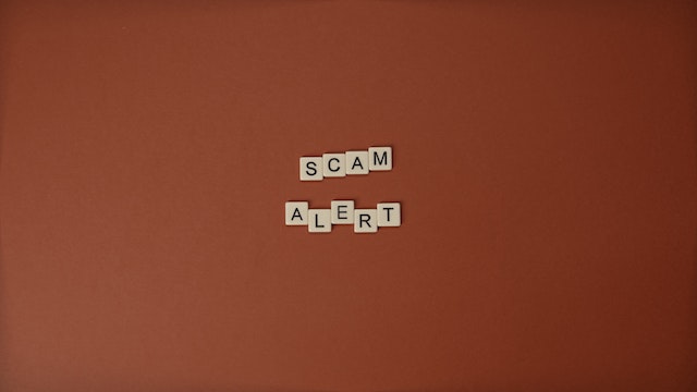 Scrabble Tile Showing Word &quot;Scam Alert&quot;