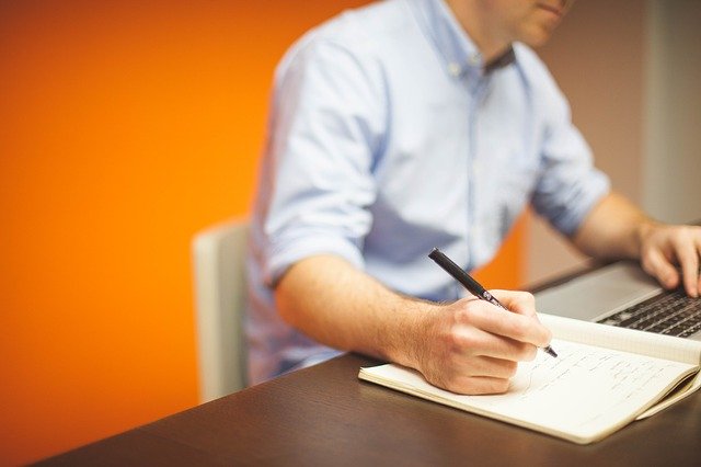 Business Continuity Plan Man Sitting at Desk Planning