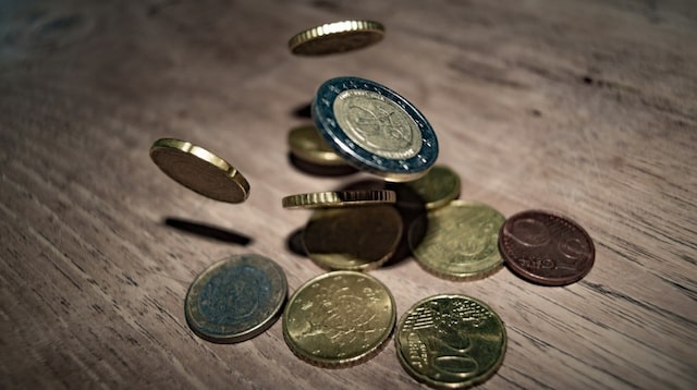 Cash Flow Statement Coins Bouncing on a Table