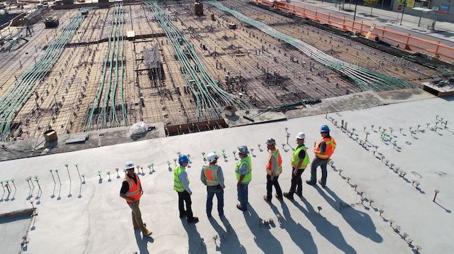 Construction Jobs Row of People on Work Site