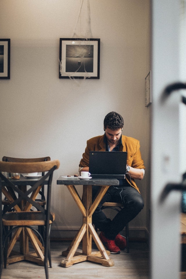 Firewall Man Using Laptop Computer