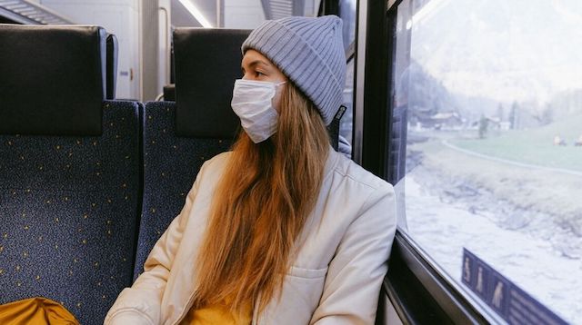 Global Economic Crisis Woman on Public Transport