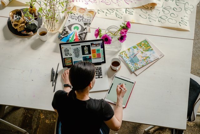 Graphic designer working at a desk