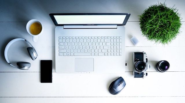 Instagram Advertising Desk with Laptop and Camera