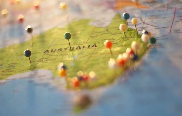 Map of Australia with push pins in it.