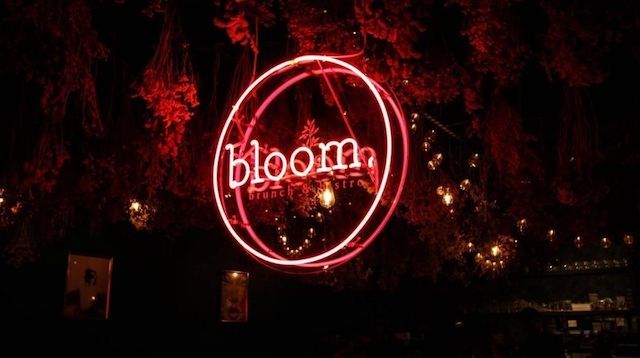 Neon Business Sign in Darkened Cafe Window