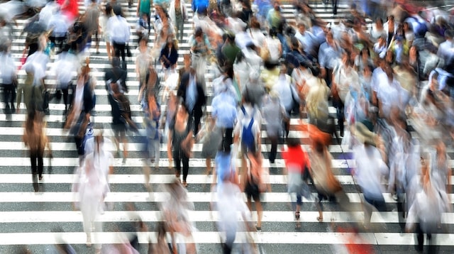 Target Market Crowd Crossing a Street