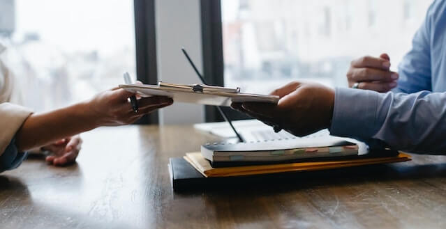 Two people working together at a table