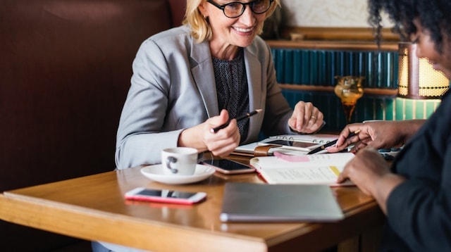 Business Structure Two Women Meeting