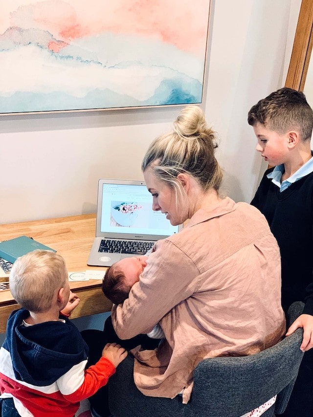 Emma with her three young sons at home