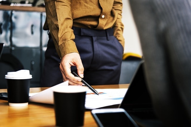 Fashion Job Man Looking at Report