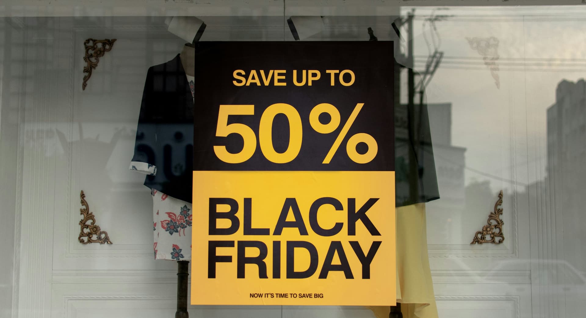 Clothing store window with a Black Friday sale sign