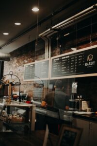 Worker behind the counter in a cafe