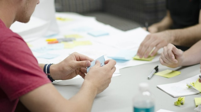 Business Model People Working at Table