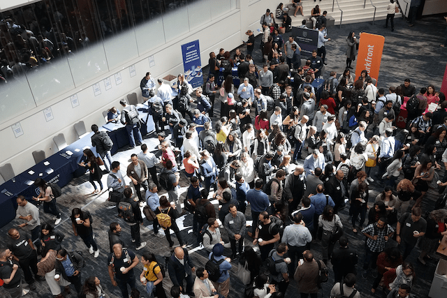 Conference Attendees Gathered at a Business Conference