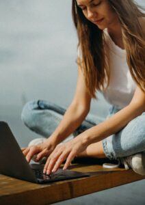 Digital Nomad Woman with Laptop Outside