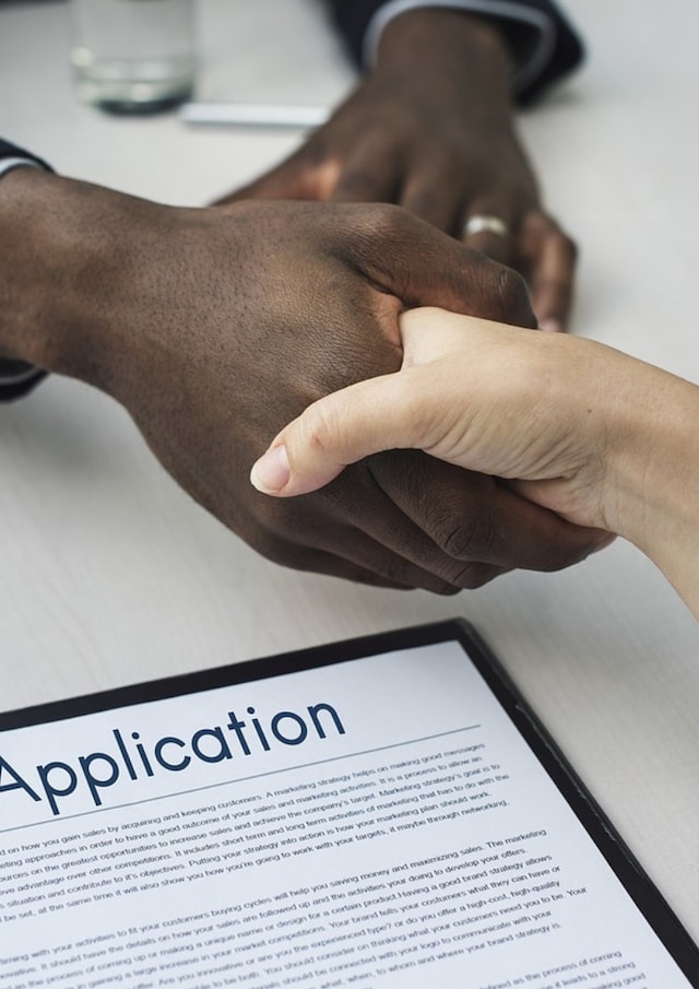 Employment Contract Two People Shaking Hands