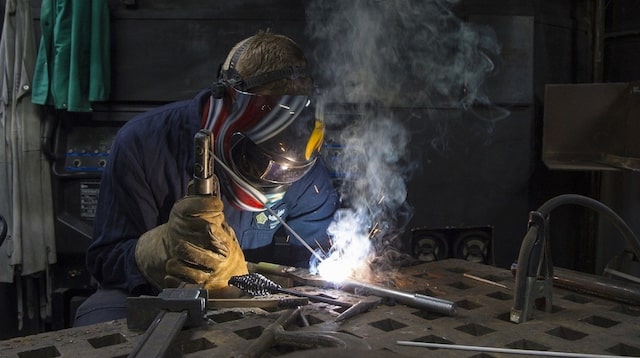 Financial Statement Man Welding