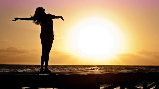 Fresh Start Woman Standing on Pier