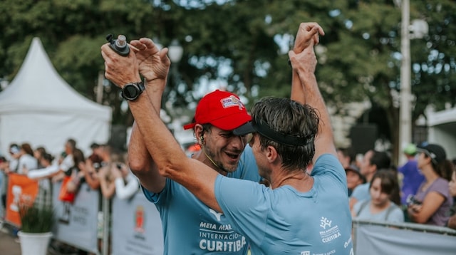 Health and Fitness Community Two Men at Finish Line