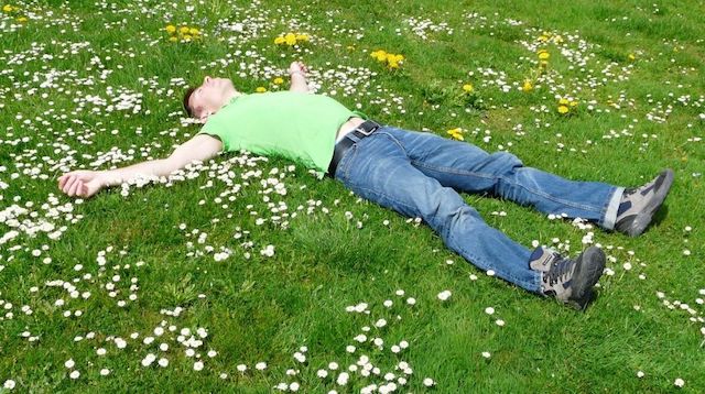 Man Lying Down on Grass