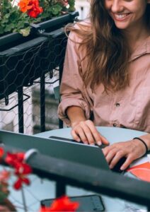 Network Firewall Woman Working Outside on Laptop