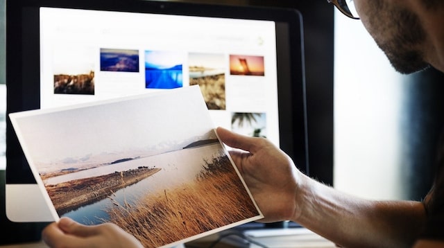 New Year Resolution Man Looking at Photographs