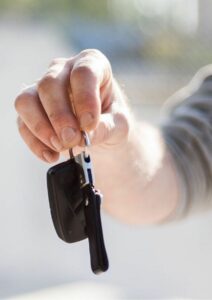 Passive Income Ideas Man with Car Key