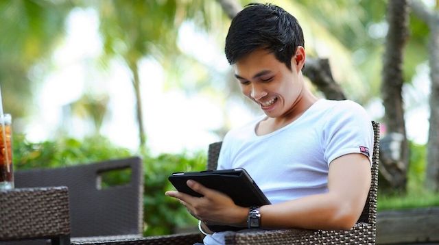 Passive Income Ideas Man with Tablet