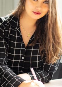 Real Estate Broker Woman Sitting at Desk