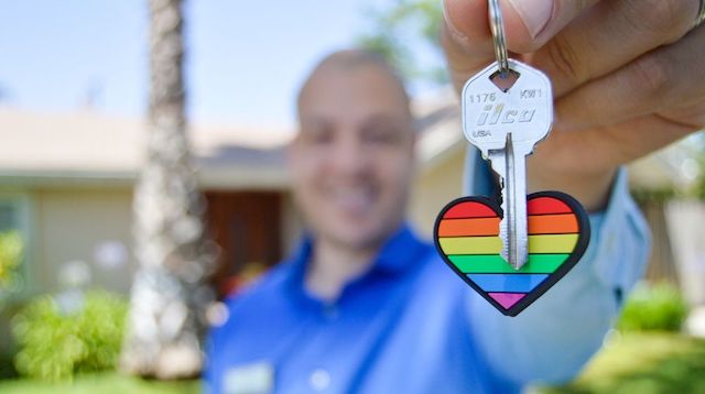 Real Estate License Man Holding Keys