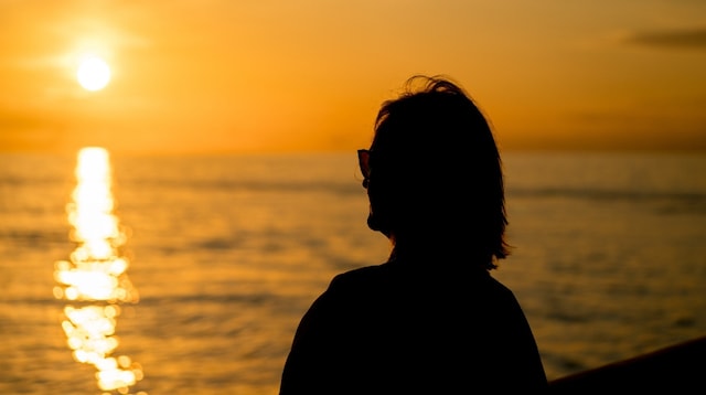 Retirement Planning Woman Watching Sun Set