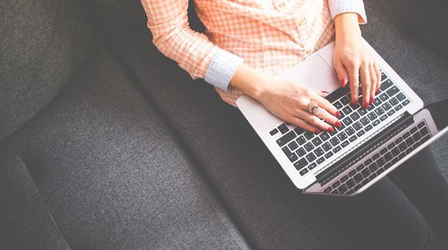 Strategic Management Woman Working on Laptop