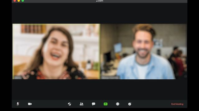 Two People on Zoom Laughing and Talking