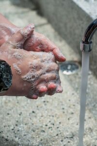 Workplace Health and Safety Person Washing Hands