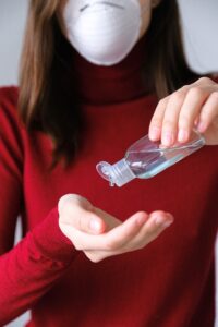 Workplace Safety Woman Applying Hand Sanitizer