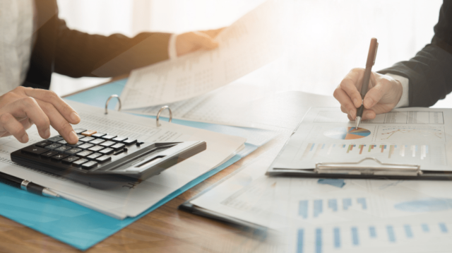 Accountants at work at a desk