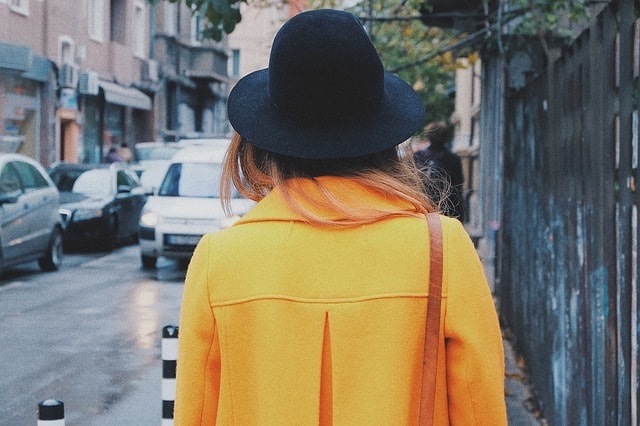 Fashion Blogger Woman in Black Hat