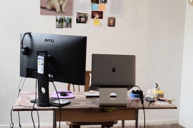 Woman working from her kitchen counter