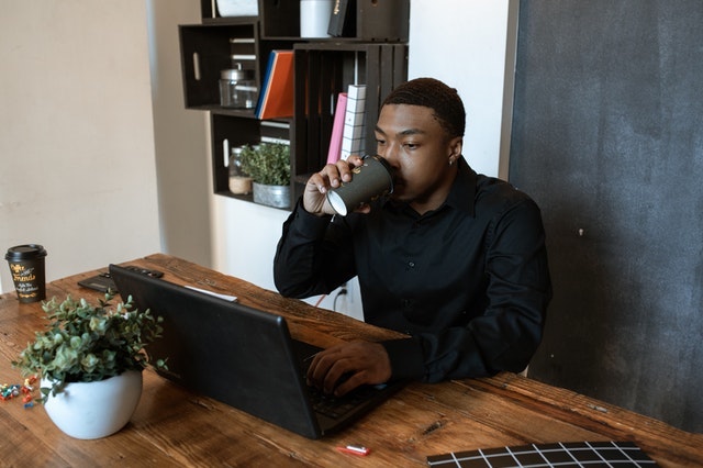 Man sipping coffee