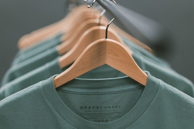 Rack of shirts bearing the company's brnd name