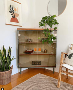 Refinished Atelier Renouveau glass-front corner cabinet