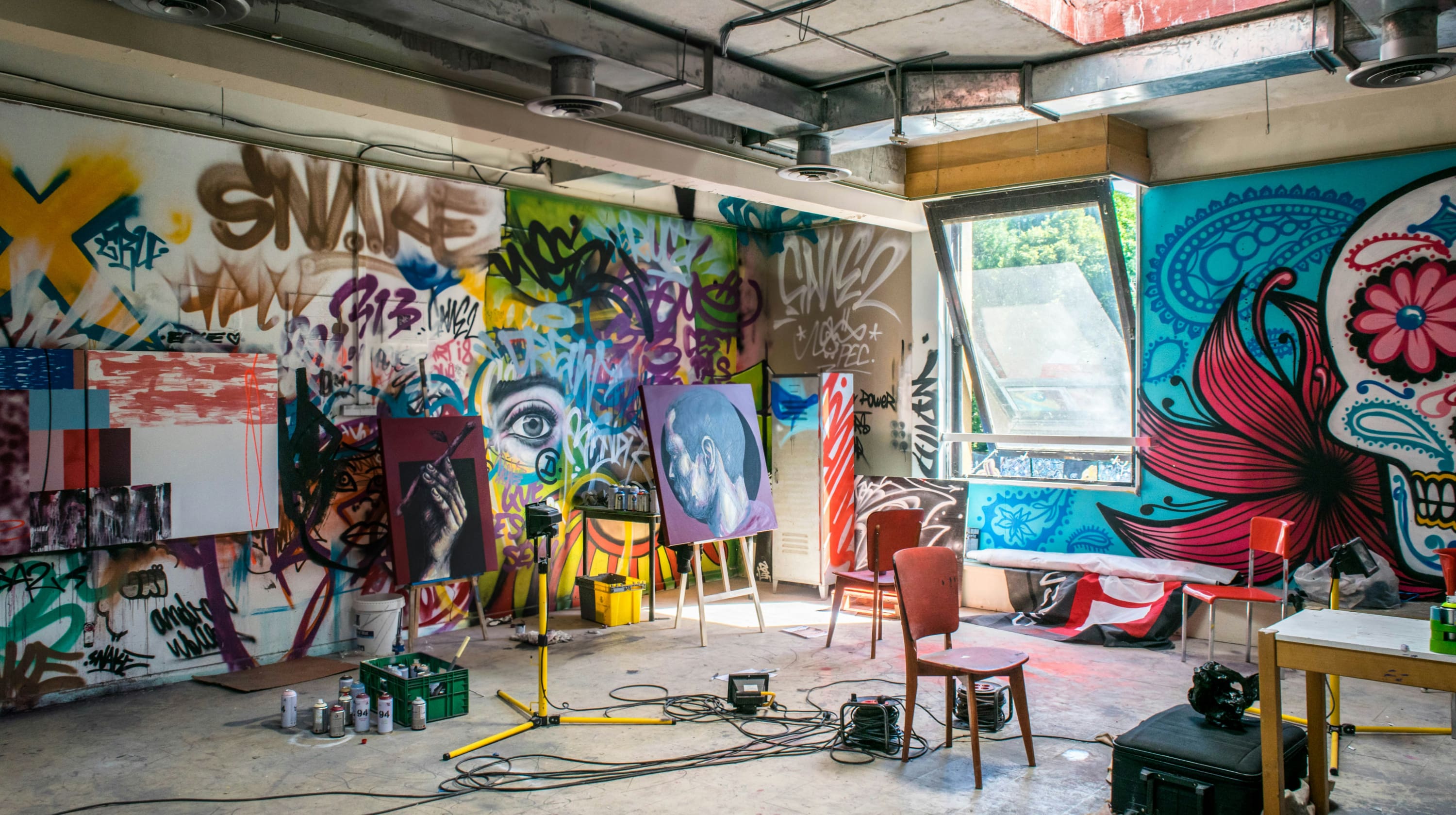 Artist's studio with bold murals