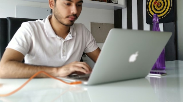 Types of Marketing Research Man on Laptop