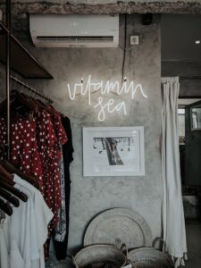 Rack of Colourful Clothes in Clothing Shop