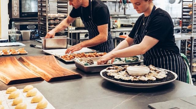 Training and Development Process Two People in Kitchen