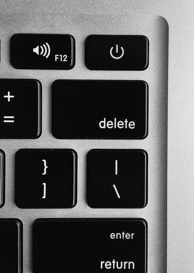 Close-up of delete button on a laptop keyboard